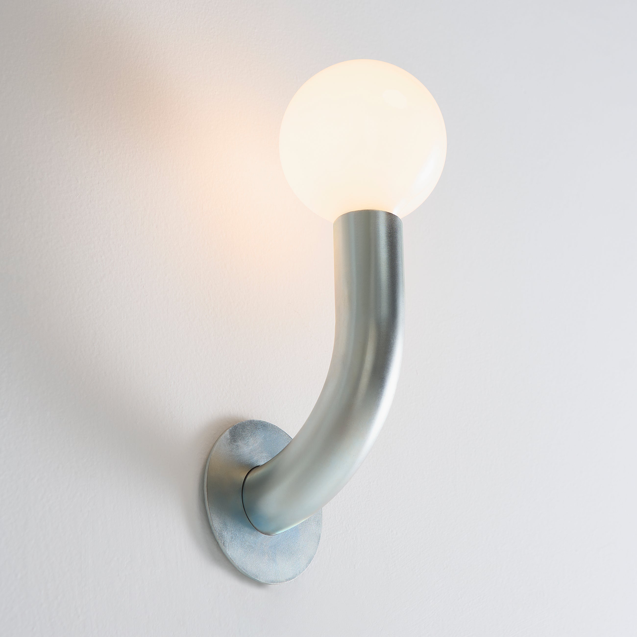 Aplique de pared de zinc Curva