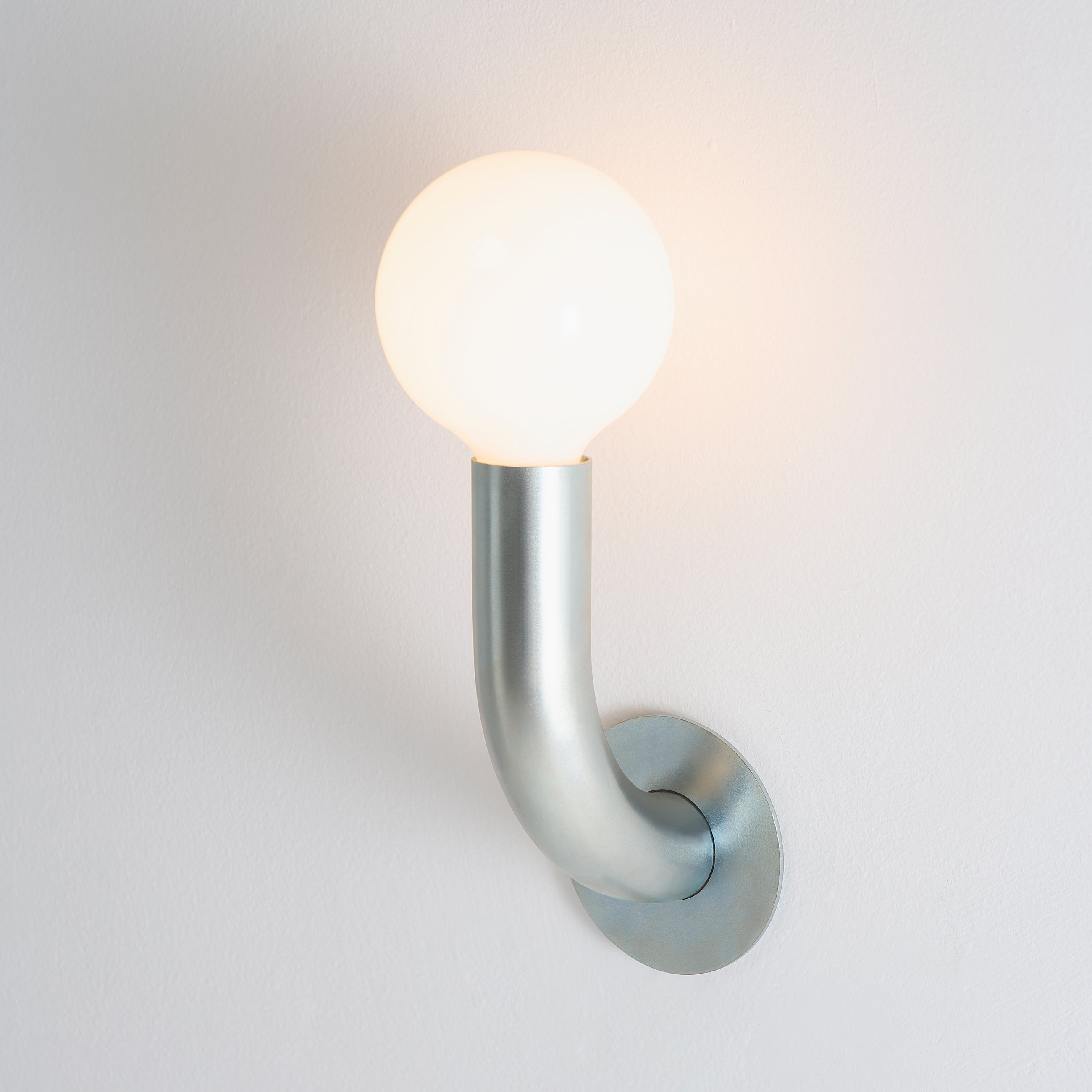 Aplique de pared de zinc Curva